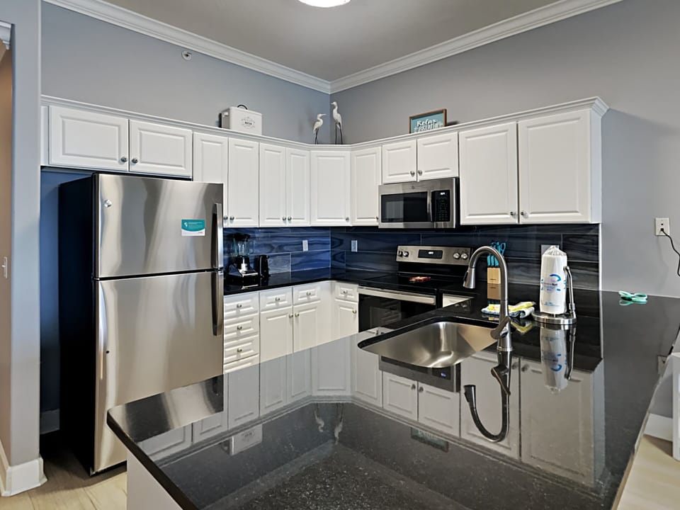 Condo, Multiple Beds, Kitchen, Ocean View (Ocean Villa #2106) | Private kitchen | Fridge, microwave, coffee/tea maker, cookware/dishes/utensils