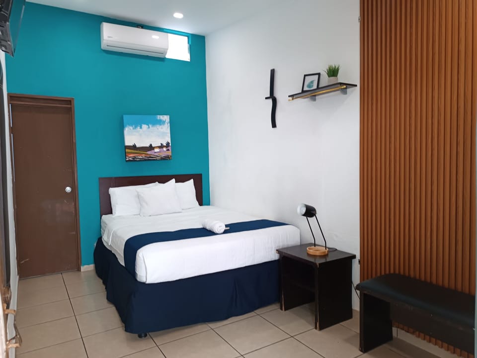 Economy Room | Bathroom | Rainfall showerhead, hair dryer, towels, soap