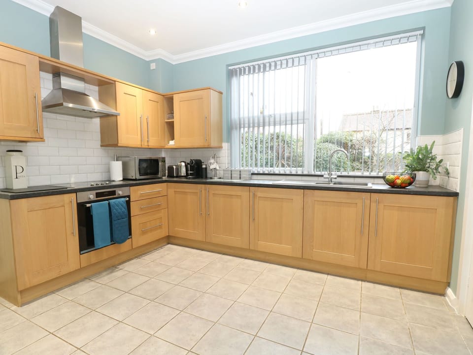 Fridge, electric kettle, cookware/dishes/utensils