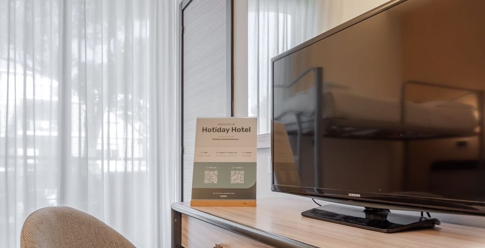 Quadruple Room | Minibar, in-room safe, desk, free WiFi