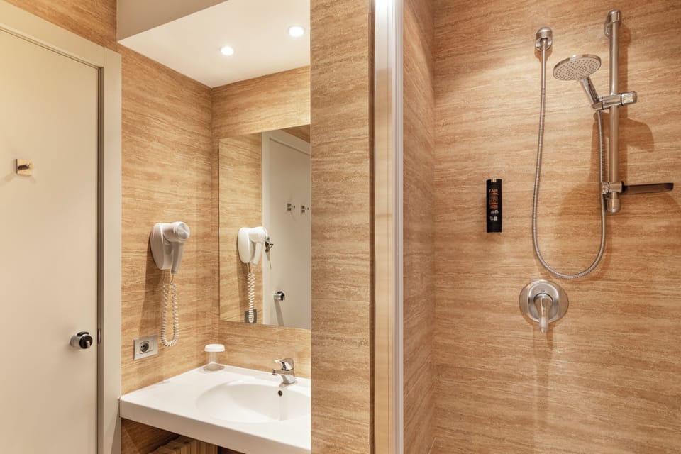 Comfort Room | Bathroom | Hair dryer, bidet, towels