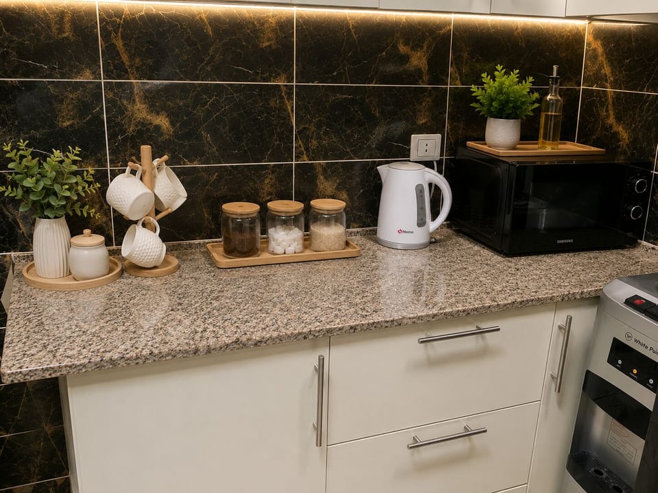 Grand Apartment | Private kitchen | Full-size fridge, microwave, oven, blender