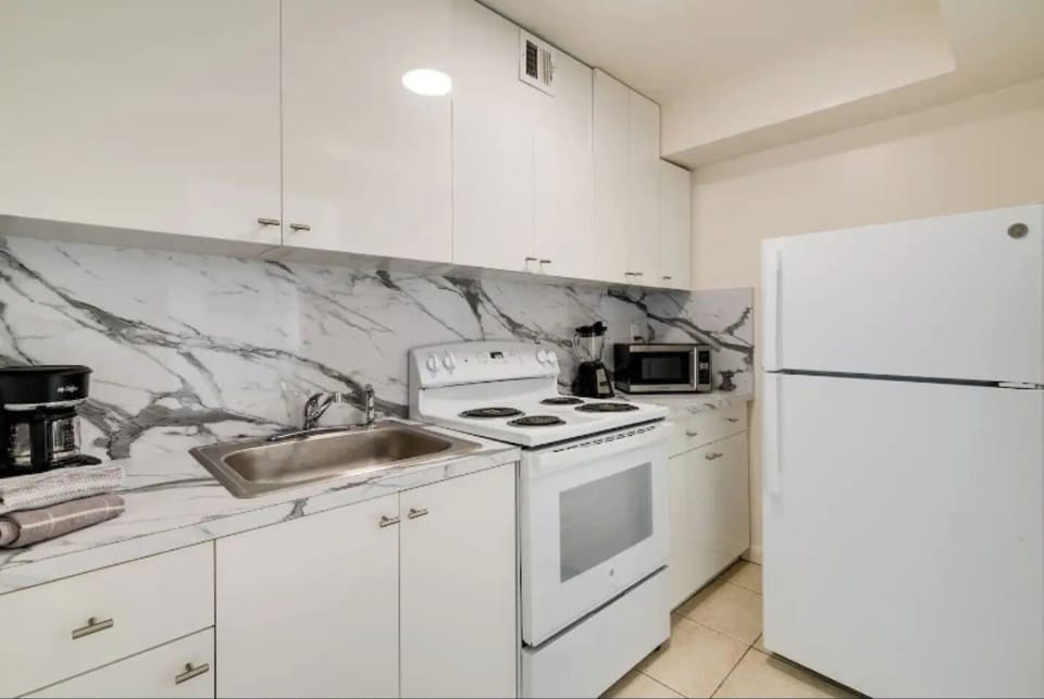 Maximize your stay with the convenience of this fully equipped kitchenette.