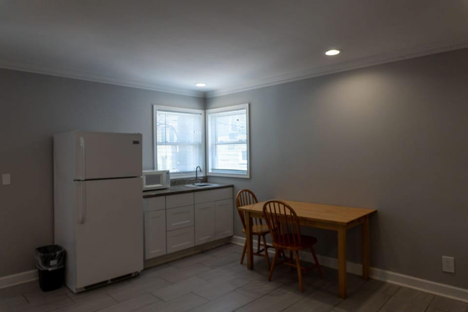Family Room, 2 Queen Beds | Iron/ironing board, free WiFi, bed sheets