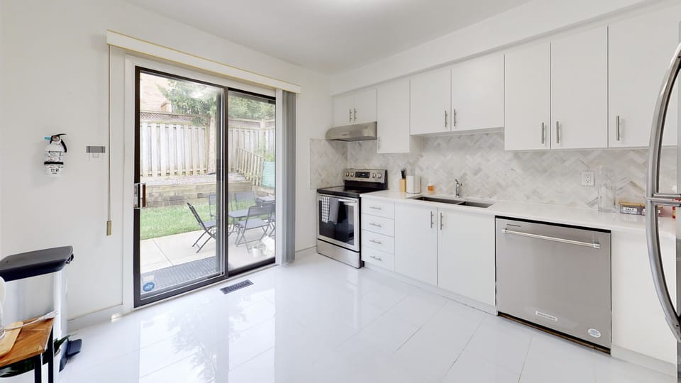 LARGE SLIDING DOOR, TONS OF DAYLIGHT, Quartz countertop, ALL NEW APPLIANCES, ETC