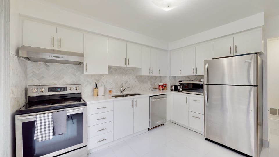 LARGE SLIDING DOOR, TONS OF DAYLIGHT, Quartz countertop, ALL NEW APPLIANCES, ETC