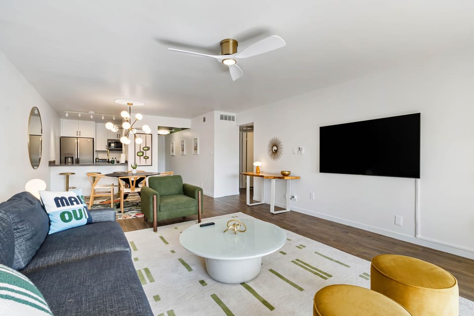 Living Room with Comfortable Seating- Colorful decor throughout