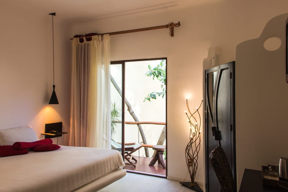 Deluxe Double Room, 1 King Bed, Pool View | Minibar, in-room safe, blackout drapes, iron/ironing board
