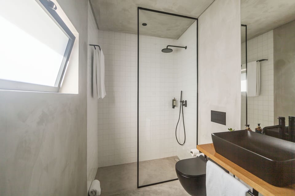 Double Room | Bathroom | Shower, hair dryer, slippers, towels