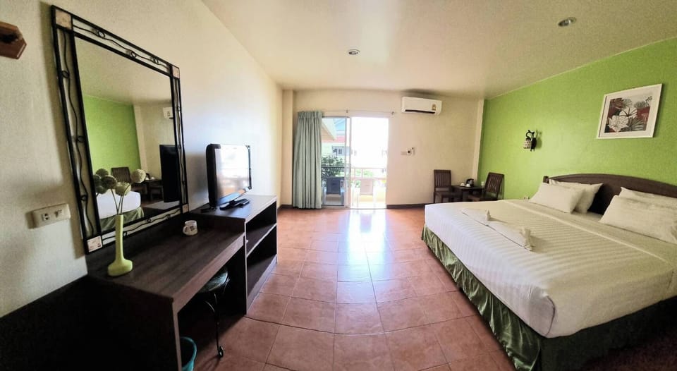 Standard Pool View Room | Minibar, in-room safe, desk, laptop workspace