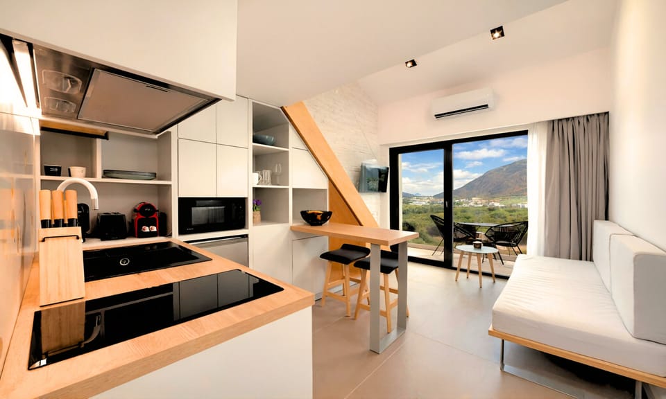 Deluxe Apartment, 1 Bedroom, Balcony, Sea View | Private kitchen | Mini-fridge, microwave, stovetop, espresso maker