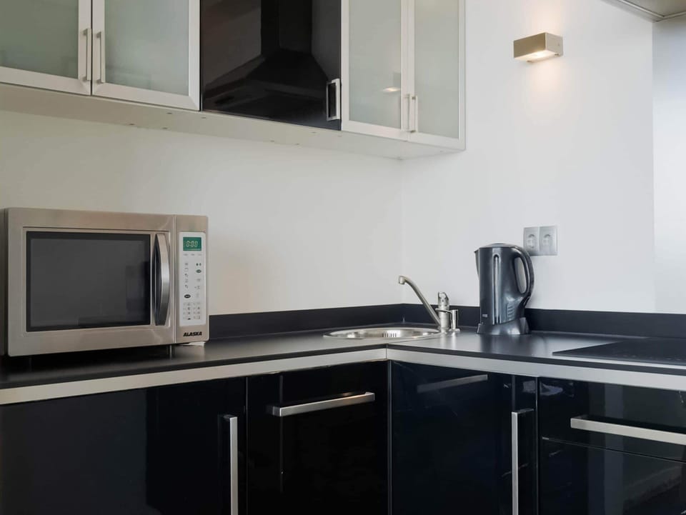 Apartment | Private kitchen | Stovetop, coffee/tea maker