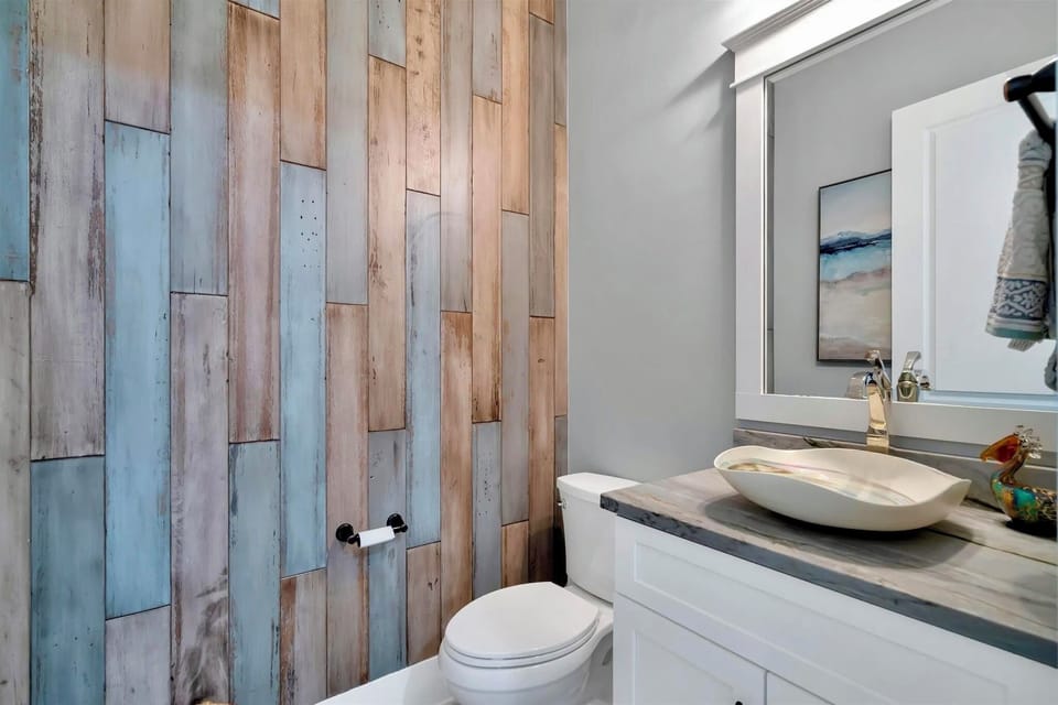 Main floor half bath - Located off of living room
