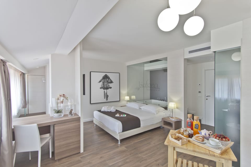 Frette Italian sheets, premium bedding, down comforters, minibar