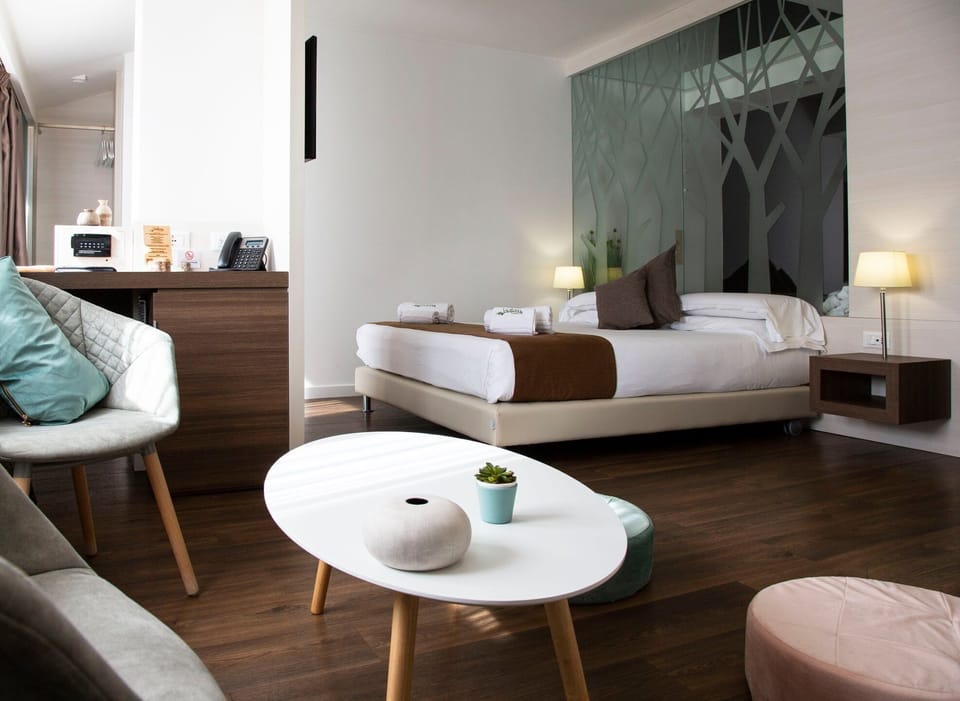 Junior Double Room, Non Smoking | Frette Italian sheets, premium bedding, down comforters, minibar