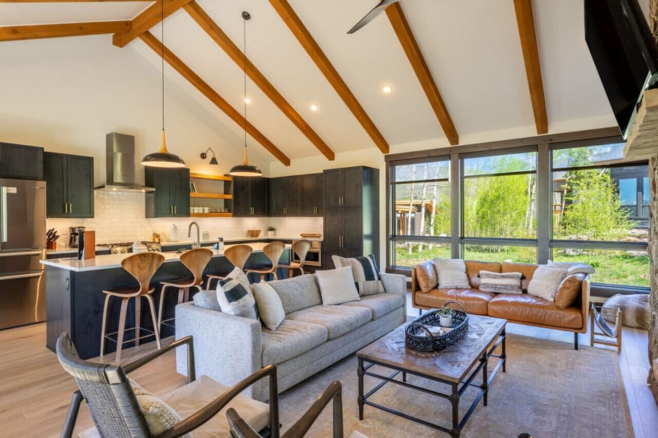Cozy living area with a fireplace and gorgeous natural light