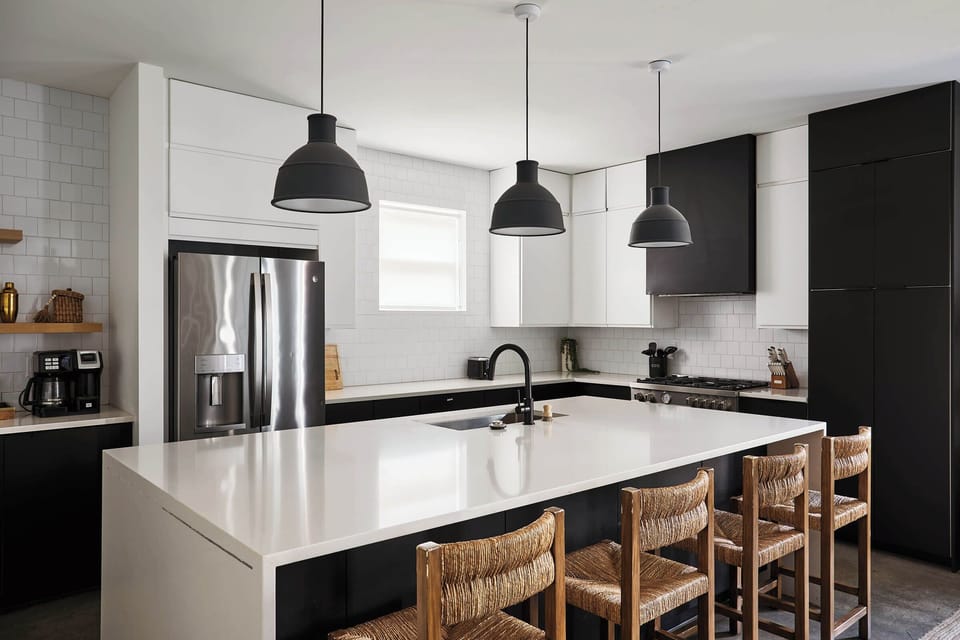Modern elegance meets cozy charm in this beautifully designed kitchen, complete with sleek finishes, a spacious island, and stylish pendant lighting—perfect for gathering and creating memorable meals.