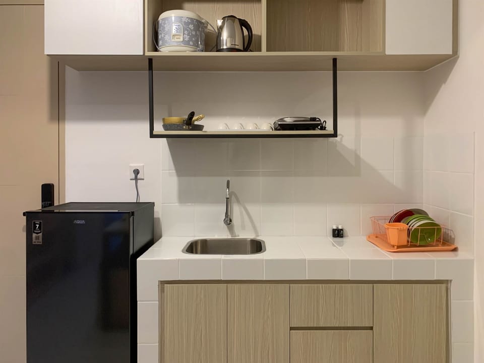 Standard Apartment | Private kitchen | Full-size fridge, stovetop