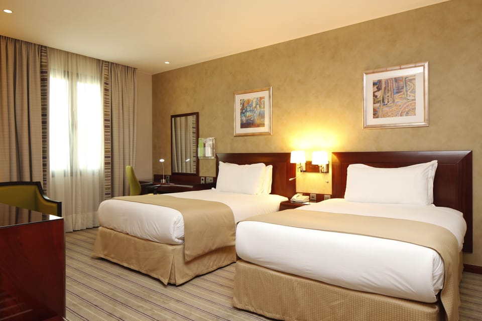 Standard Room, 2 Twin Beds, Smoking, City View | Minibar, in-room safe, blackout drapes, soundproofing