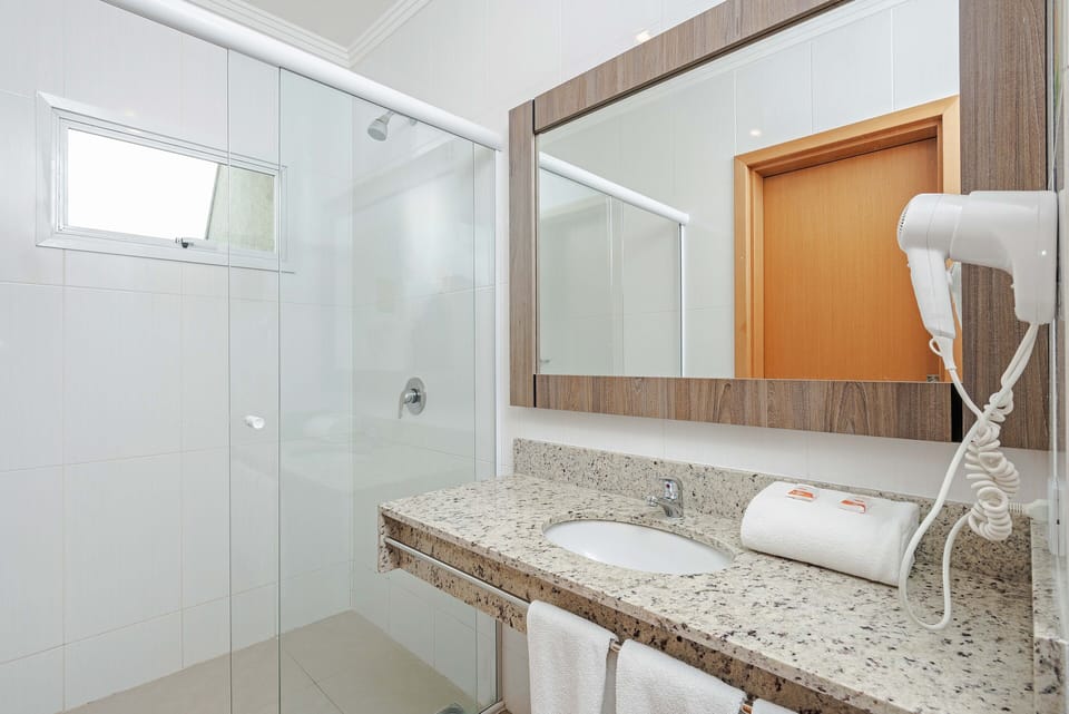 Shower, free toiletries, hair dryer, towels