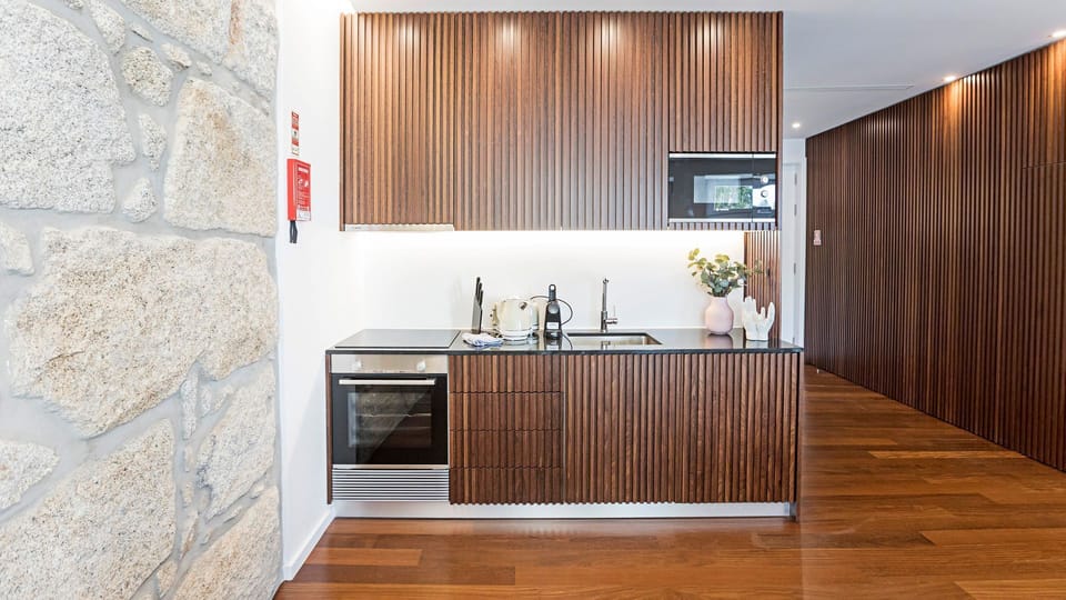 Lovely kitchenette, equipped with high-quality appliances and every supply you might need to prepare your homemade meals #modern #wonderful #lovelystay