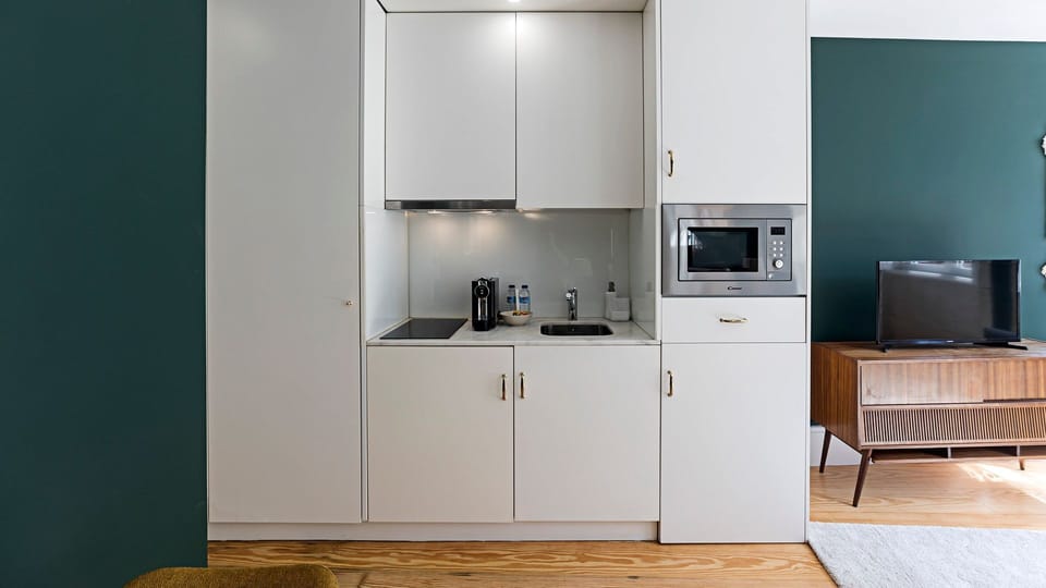 Compact kitchenette, equipped with all the essentials you might need during your stay #practical #great