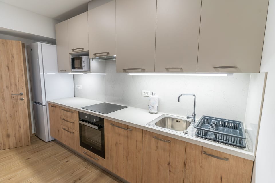 Apartment | Private kitchen | Fridge, microwave, oven, stovetop