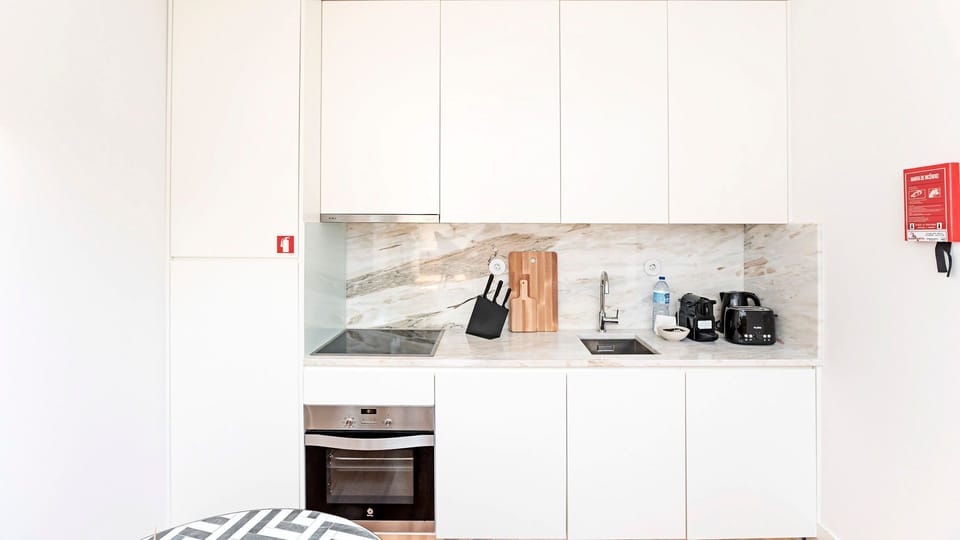 Kitchenette includes electric kettle, coffee machine, toaster and even a dishwasher and washing machine #kitchen #lovelystay