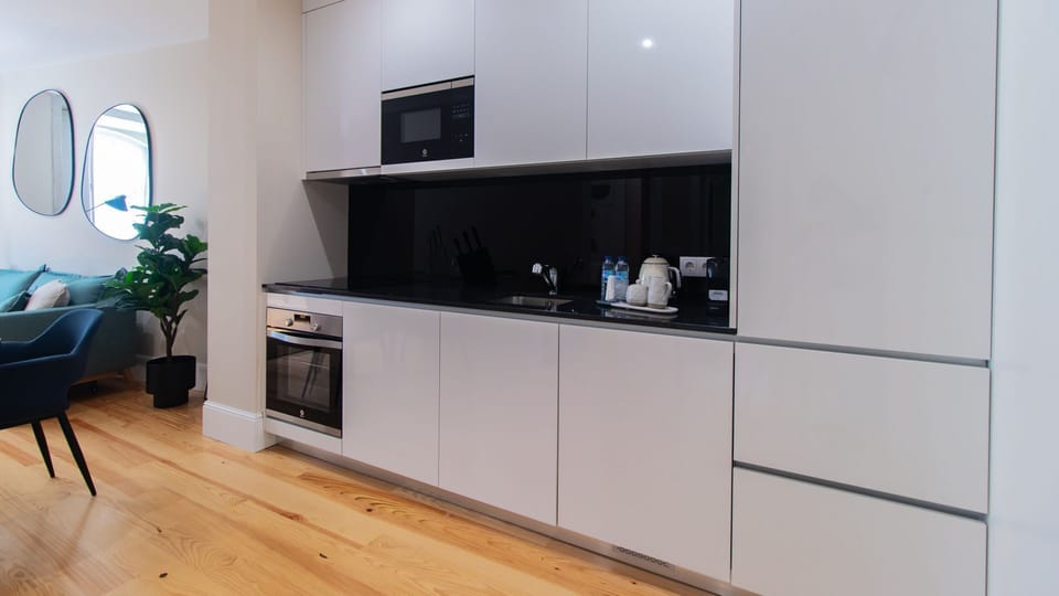 Fully equipped kitchenette with an oven, microwave, stove, electric kettle, coffee machine, toaster and fridge. #cooking #lovelystay