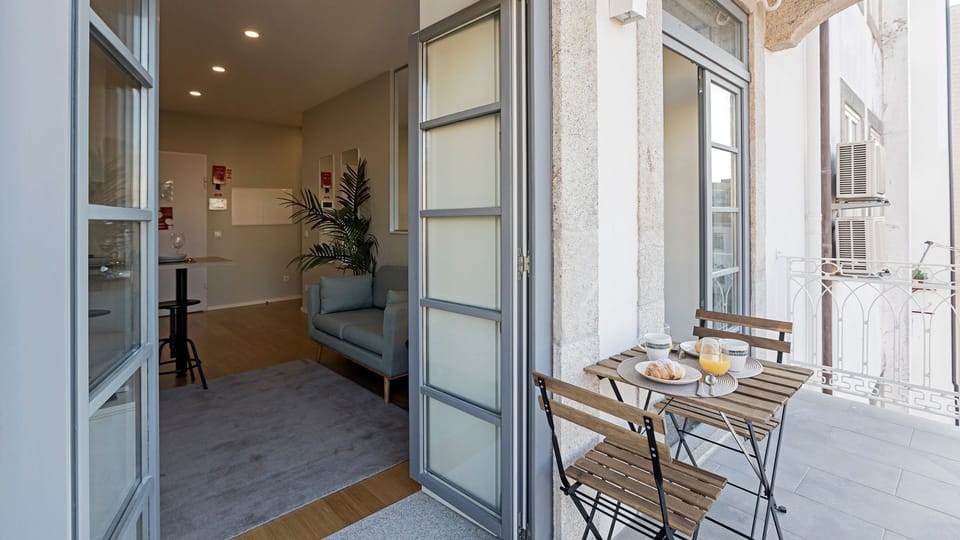Step out onto your private balcony to enjoy breakfast al fresco or an evening drink, with charming views of the city. The seamless indoor-outdoor flow extends your living space, perfect for soaking up the local atmosphere.