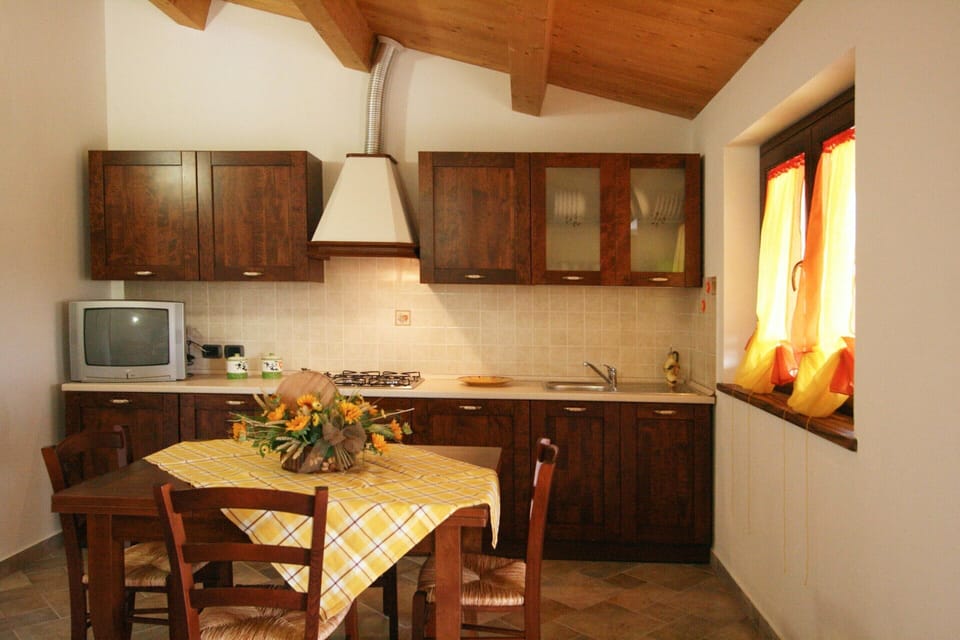 Villa | Private kitchen | Electric kettle, highchair