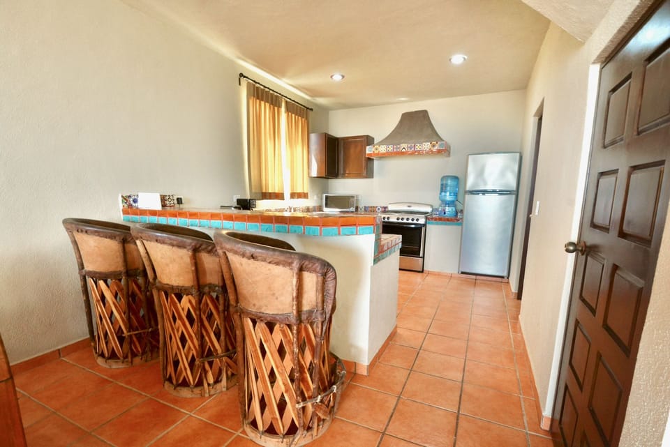 Two bedroom Ocean Front | Private kitchen | Mini-fridge, coffee/tea maker, cookware/dishes/utensils