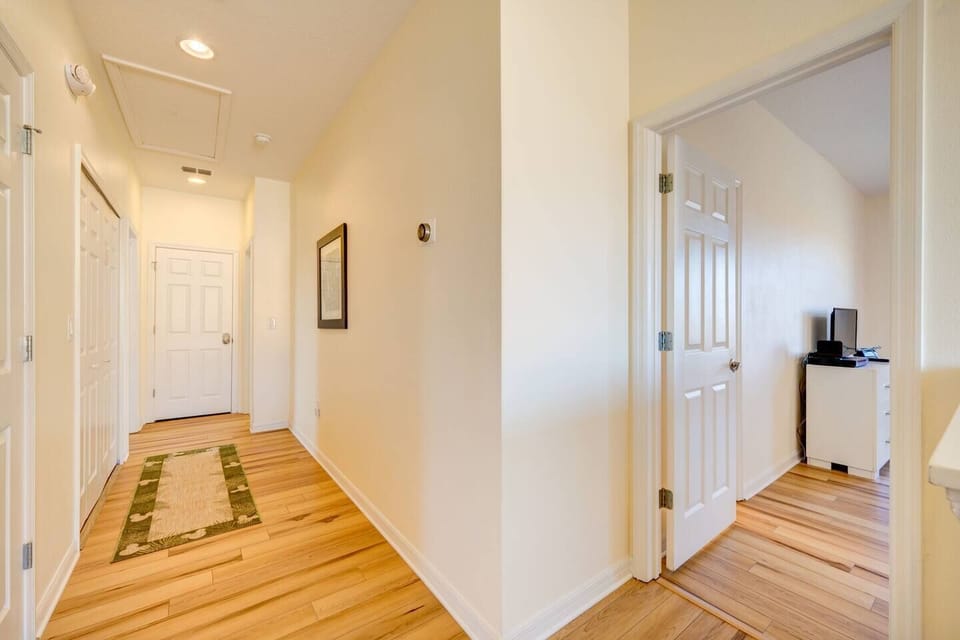 The hallway at the top of the stairs holds the 2 king bedrooms on the north side and the 2 other bedrooms with twin beds.  Off of this hallway is the laundry room. 