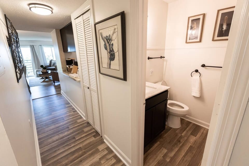 The second bathroom has a shower, sink and toilet. 