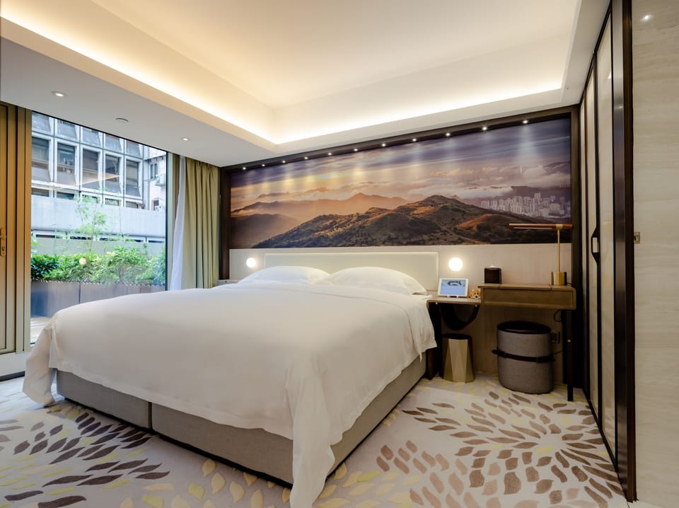 Oasis Suite | Down comforters, in-room safe, iron/ironing board, free WiFi
