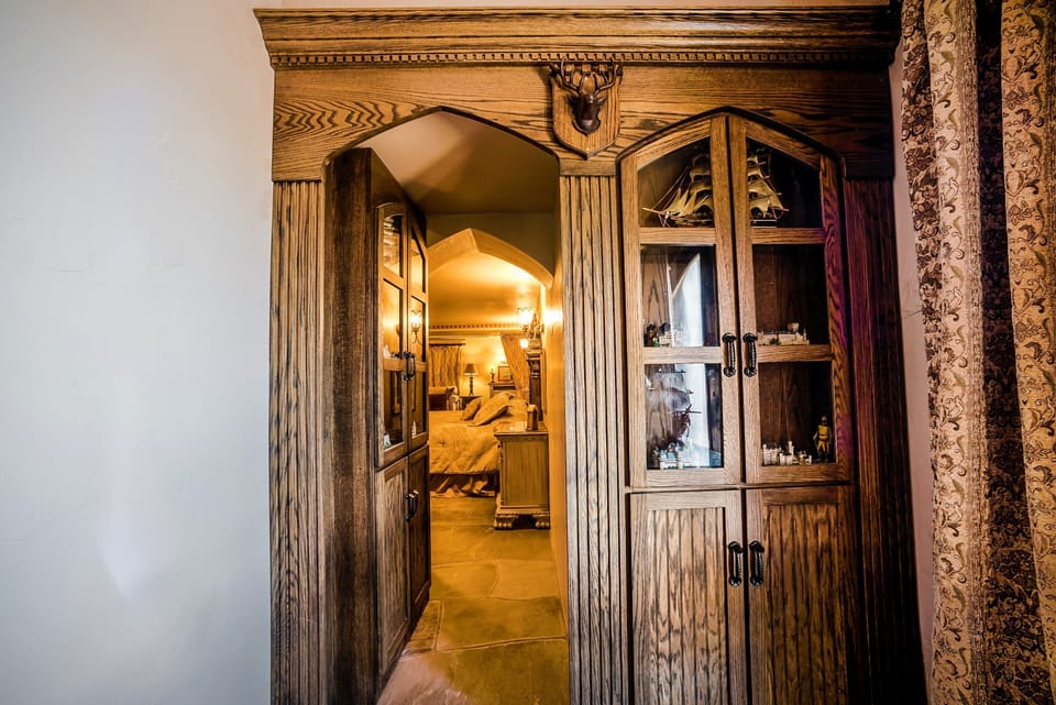 The Curio Cabinet 'secret door' connects the 2 bedrooms in 'The King's Suite'  