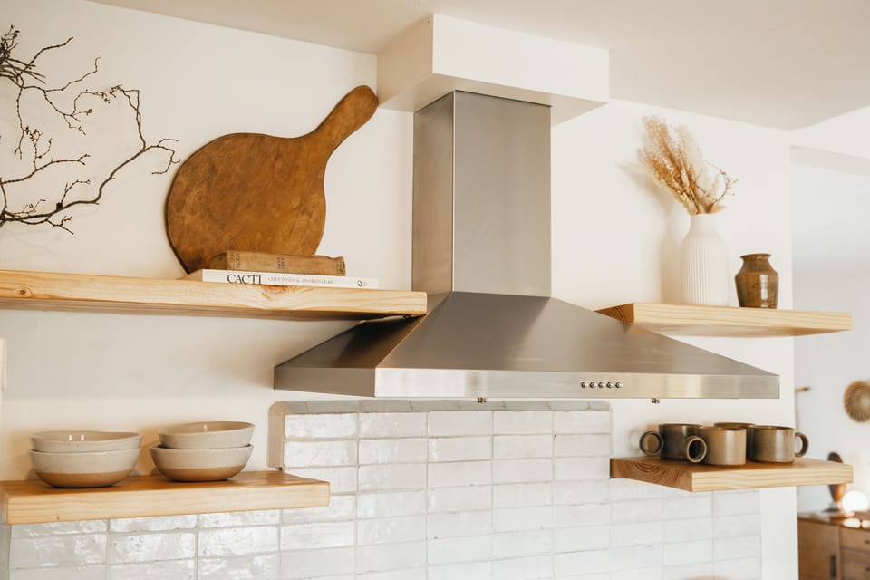 Our kitchen boasts high end Crate and Barrel dish ware.