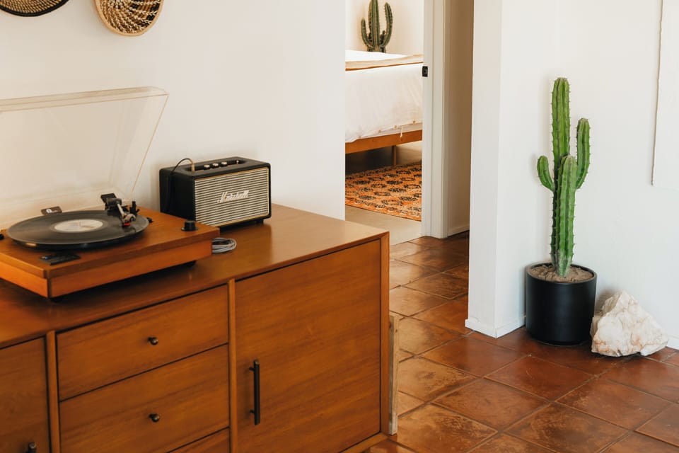 Media console with record player and bluetooth speaker