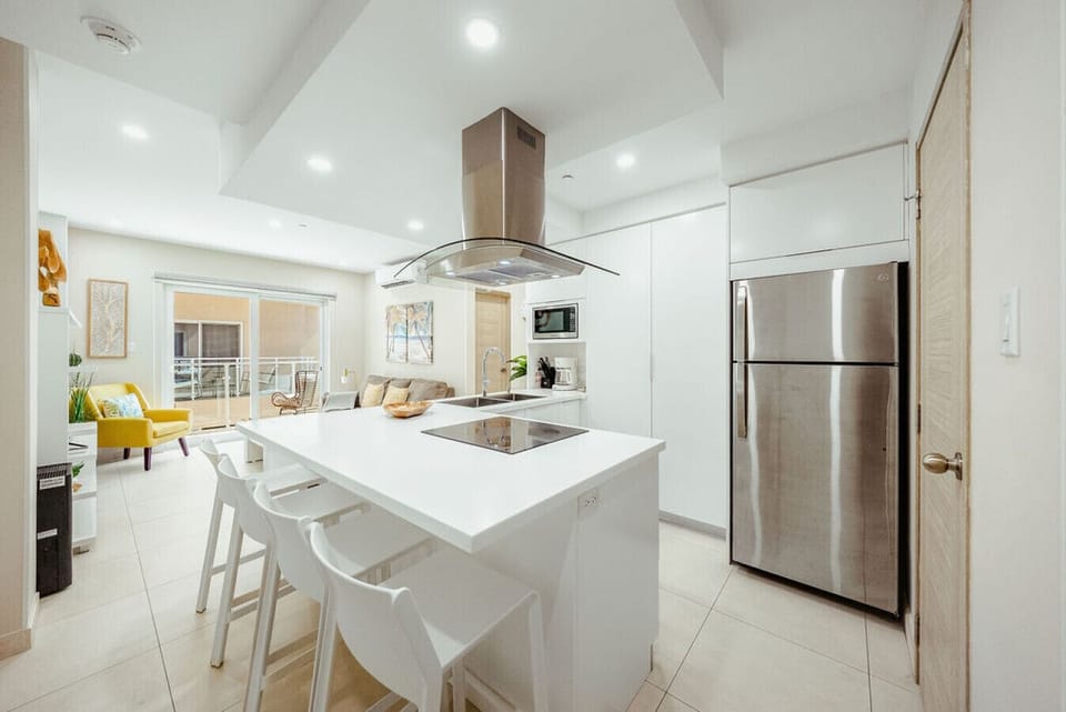 A sleek, open kitchen with a spacious island—perfect for cooking, gathering, and easy everyday living.