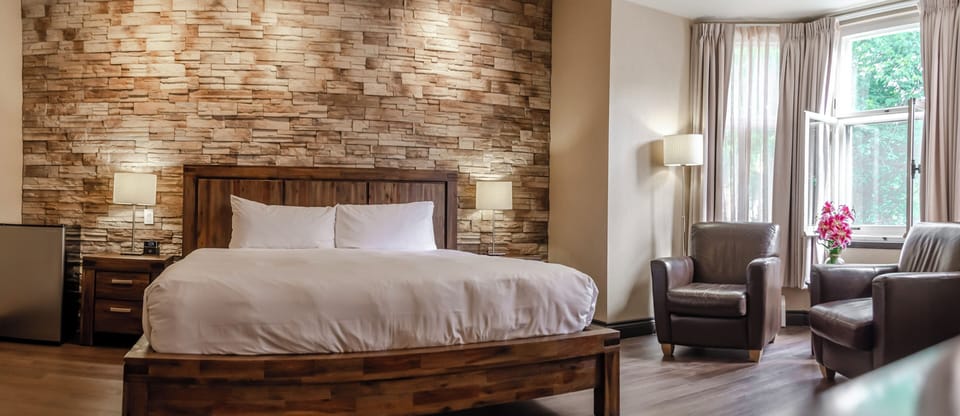 Superior Room, 1 King Bed | Premium bedding, blackout drapes, iron/ironing board, free WiFi