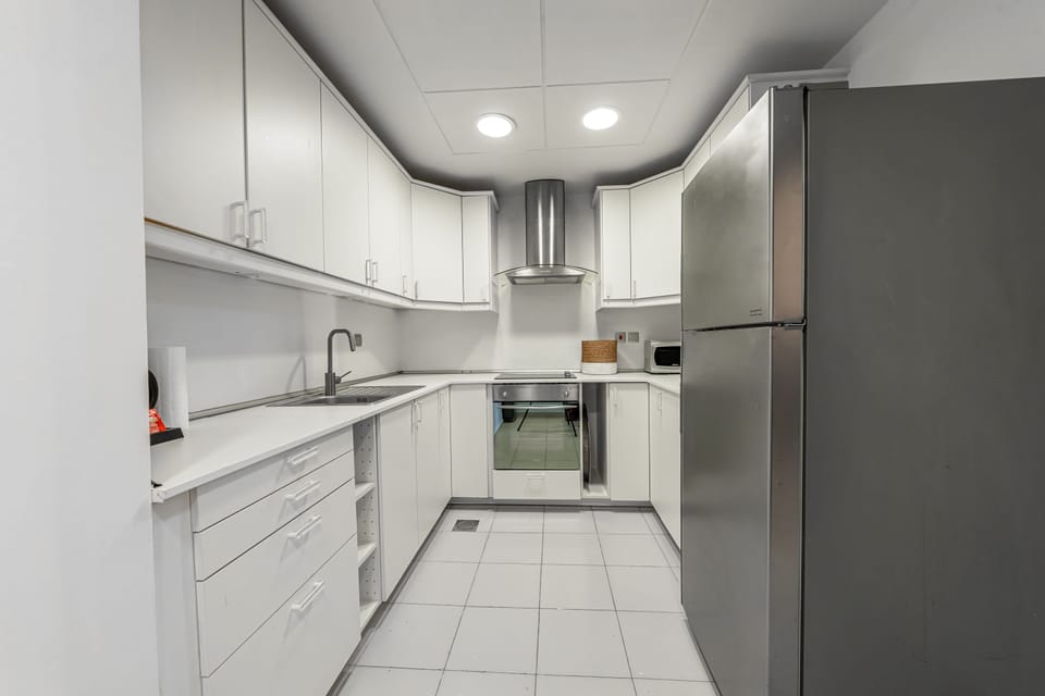 Apartment, 2 Bedrooms | Private kitchen | Fridge, microwave, oven, stovetop