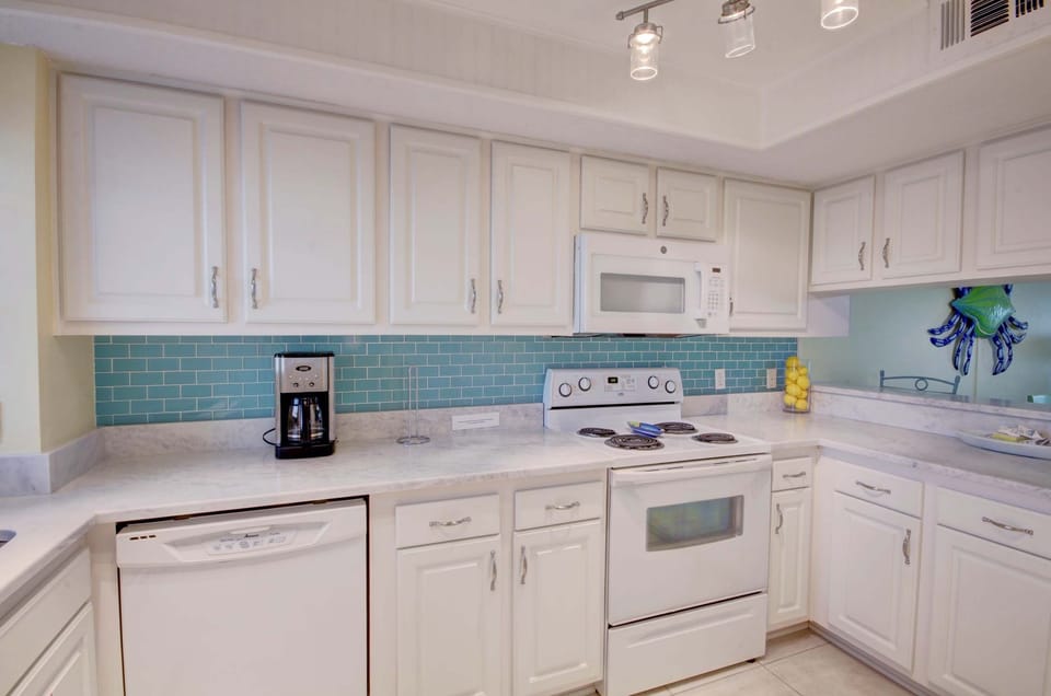 Condo, 2 Bedrooms | Private kitchen | Coffee/tea maker, fridge, oven, toaster