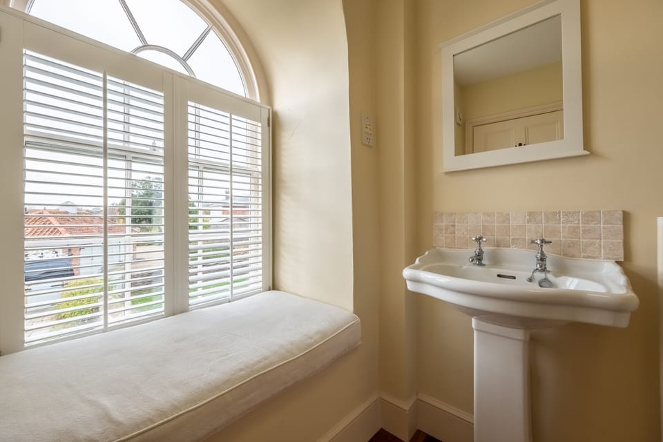 First floor: Bedroom three with double bed