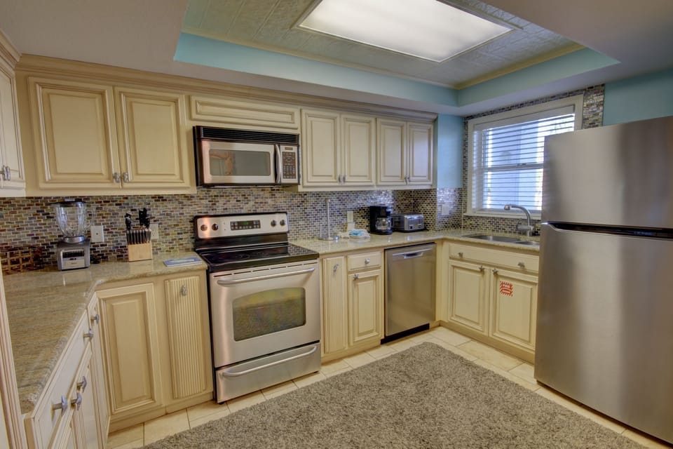 Condo, 2 Bedrooms | Private kitchen | Coffee/tea maker, fridge, oven, toaster