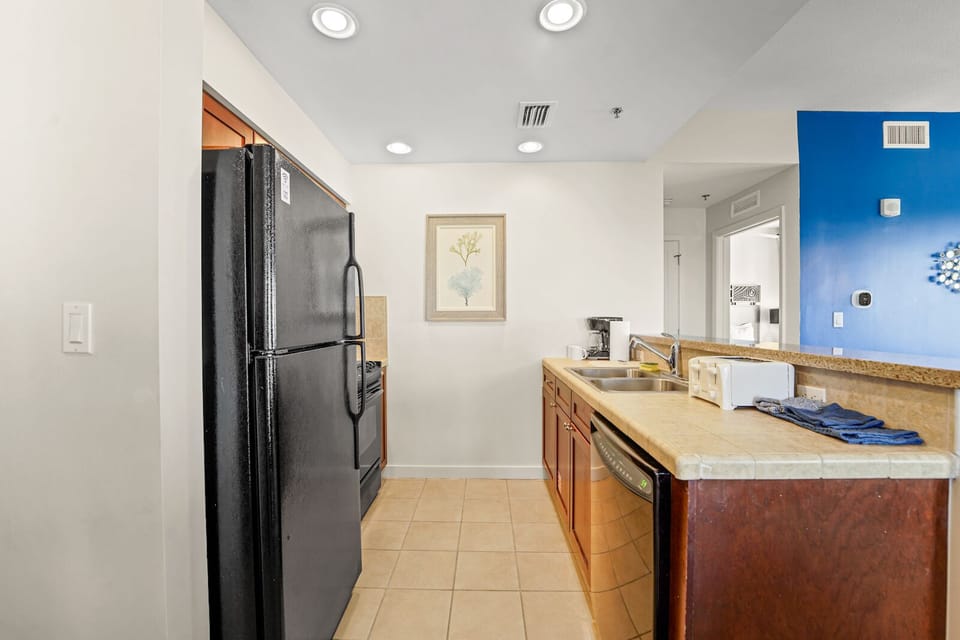 Kitchen: Refrigerator, Dishwasher, Sink, Coffee Maker, Toaster, Stove