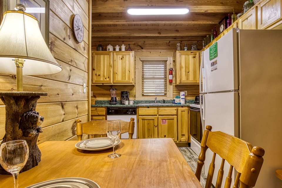 Cabin, 1 Bedroom | Private kitchen | Fridge, oven, coffee/tea maker, toaster