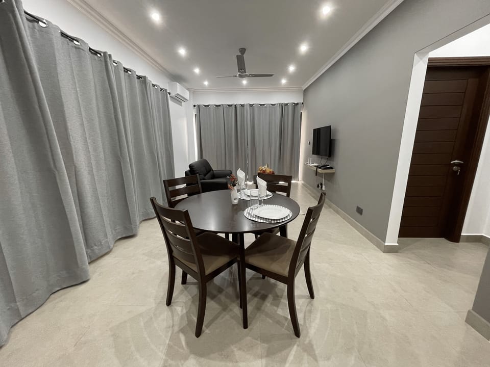 Standard Apartment | Living area | 110-cm LED TV with cable channels, TV