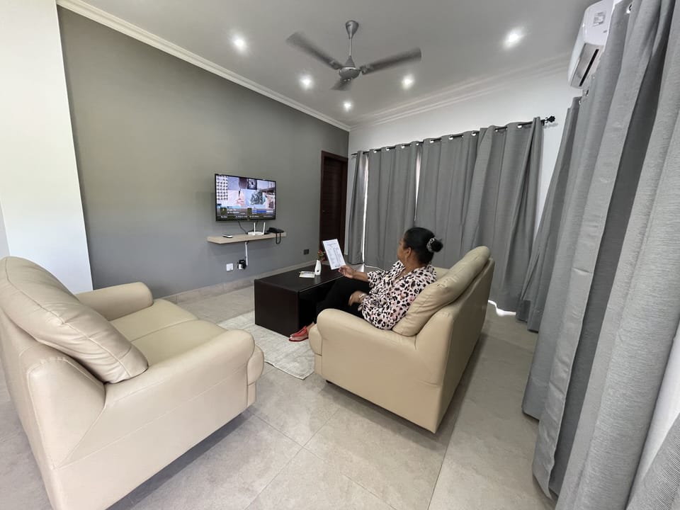 Family Apartment | Living area | 110-cm LED TV with cable channels, TV
