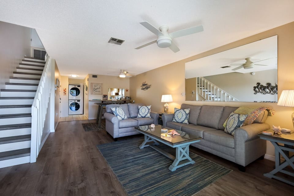Living area with newly updated sofa and loveseat
