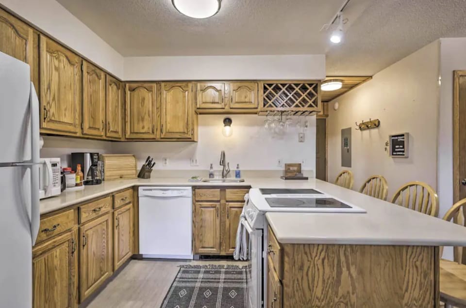 Full kitchen with all appliances, pots, pans, microwave, coffee maker, crock pot
